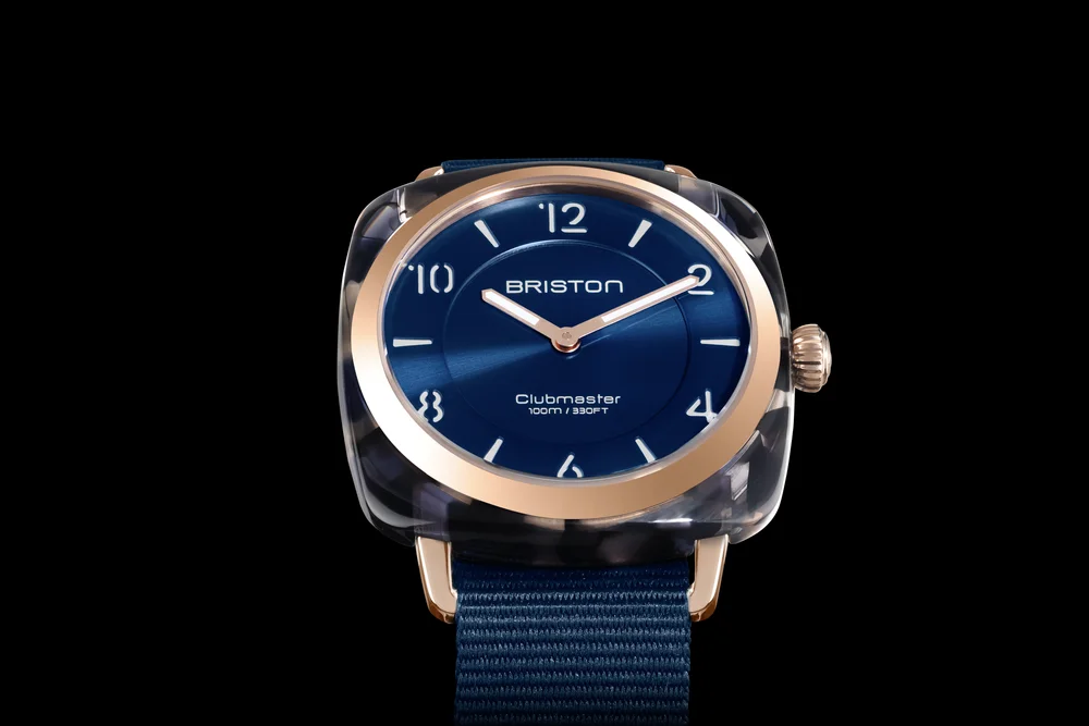 Briston Clubmaster Chic watch with navy dial and rose gold detailing on a navy strap
