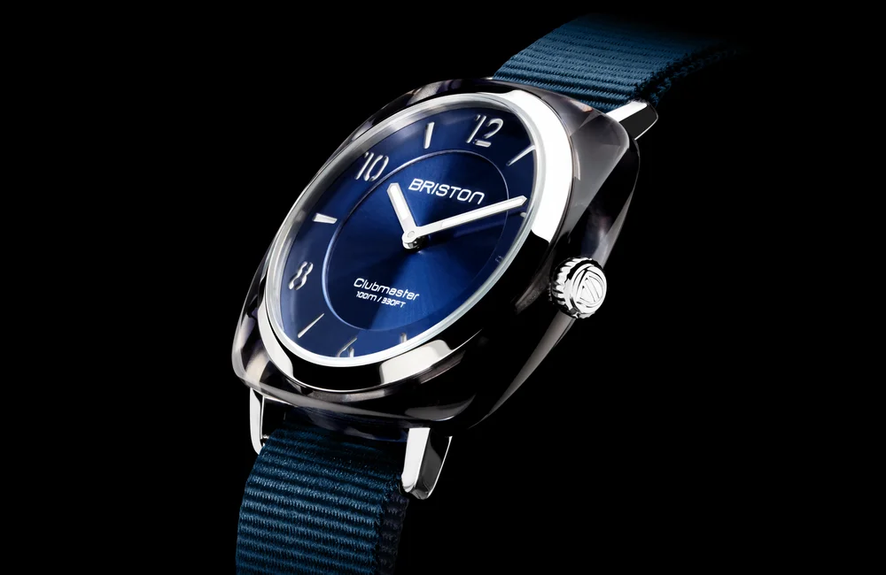 Briston Clubmaster Chic watch with midnight blue dial and steel bezel on a navy strap