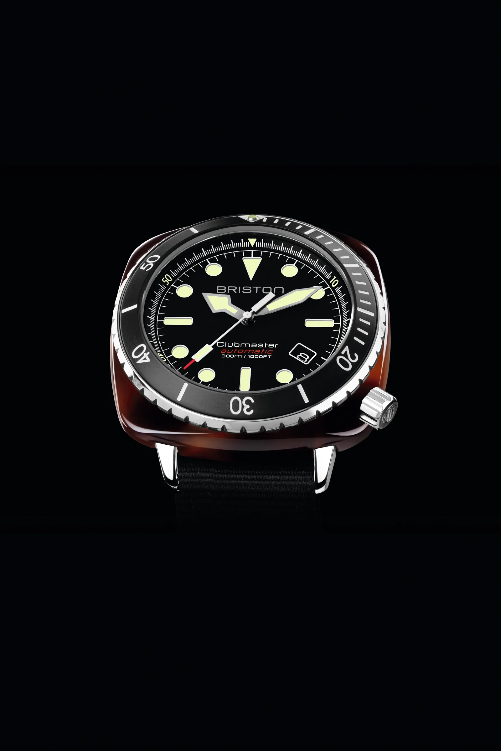 Briston Clubmaster Diver Pro with black dial, rotating bezel and tortoiseshell acetate case on a steel bracelet