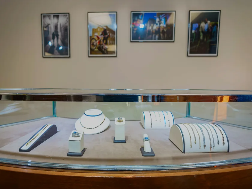Jewelry display case with rings and tennis bracelets