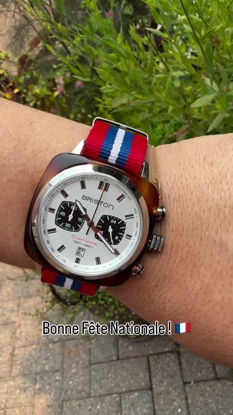 A Briston Clubmaster chronograph on a red, white and blue strap