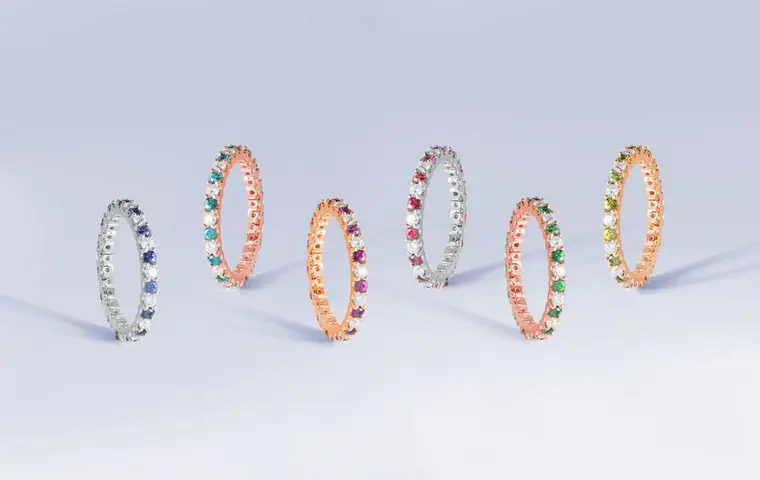 Eternity bands set with sapphires, rubies and emeralds